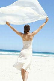 Woman walking on the beach